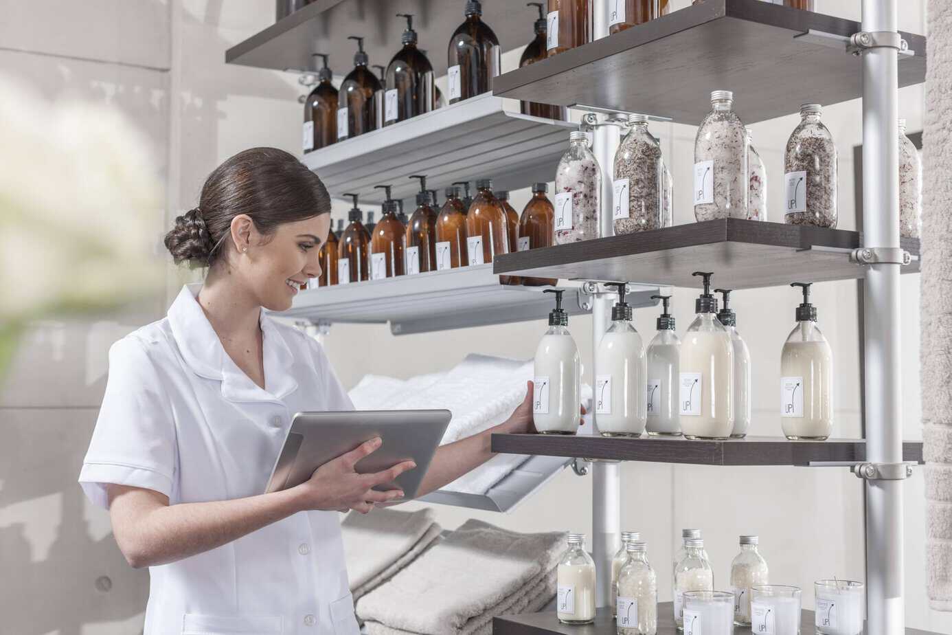 Ingredient reference library with labelled botanical samples on a formulation shelf