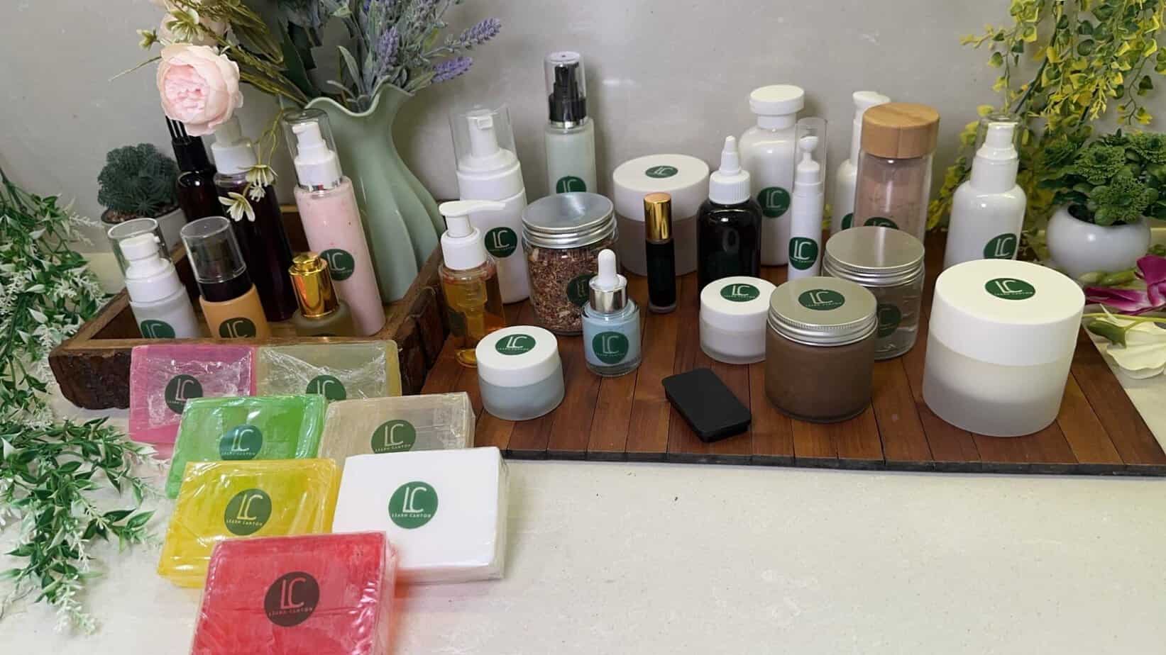 Handmade skincare product seller arranging her range